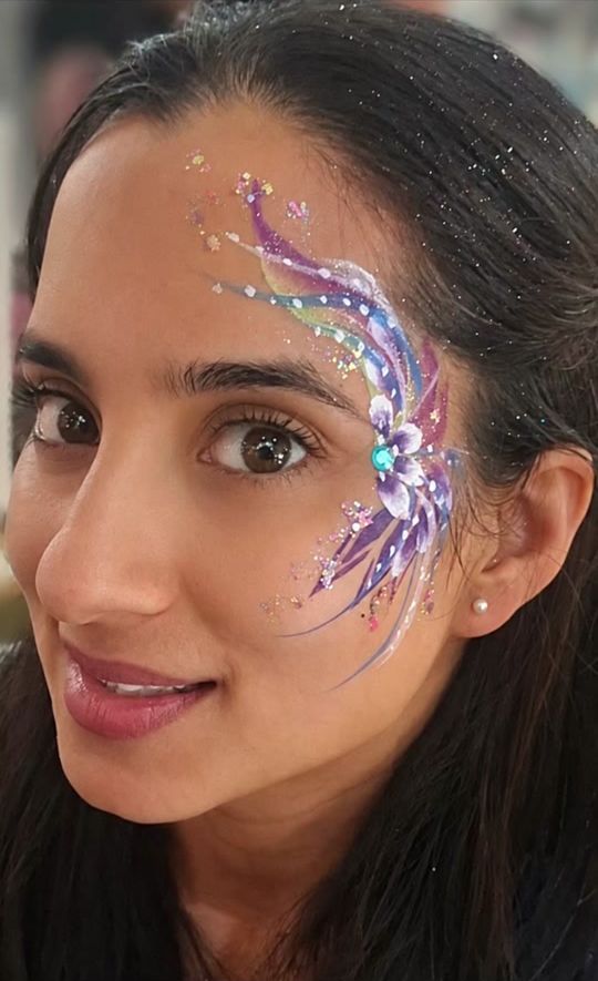 Purple and silver glitter swirl face design