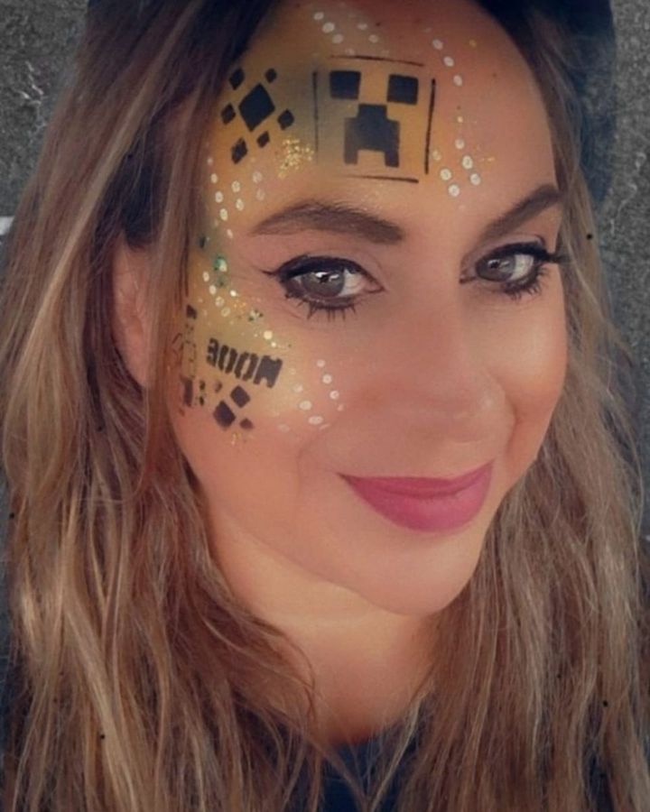 Minecraft creeper face design on an adult