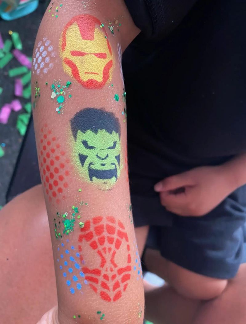 Superhero arm painting with Iron Man, Hulk and Spider-Man